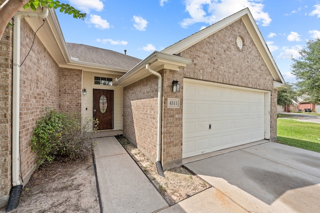 property entrance featuring a garage