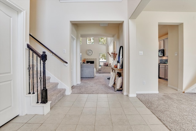 view of carpeted foyer