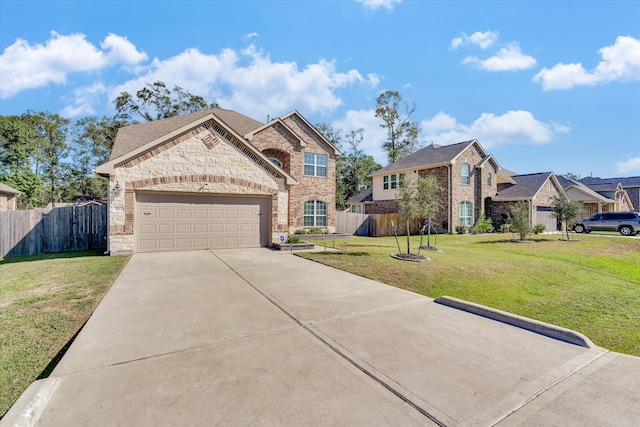 view of front of home with a garage and a front yard