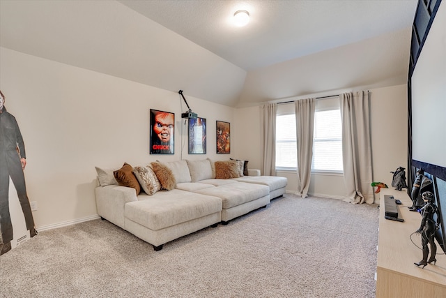 living room featuring lofted ceiling and carpet flooring