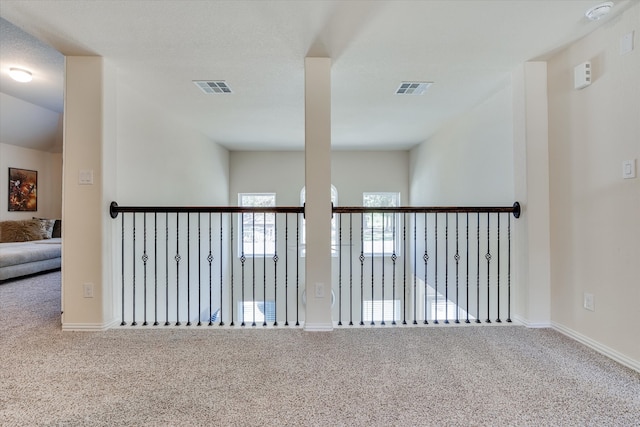 unfurnished room featuring carpet floors