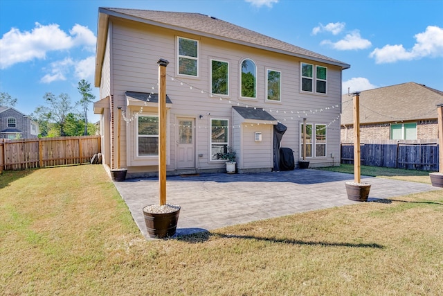 rear view of property with a lawn, a pergola, and a patio area