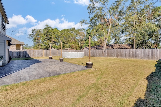 view of yard featuring a patio