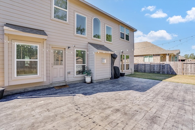 exterior space with a lawn and a patio