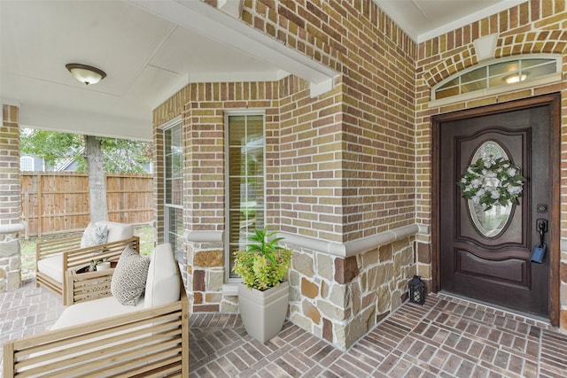 property entrance featuring covered porch