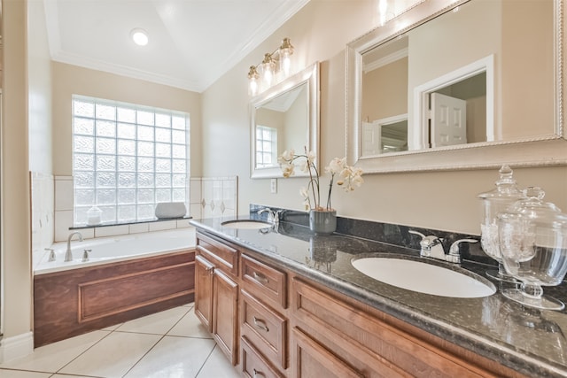 bathroom featuring vanity, tile patterned flooring, ornamental molding, and a tub