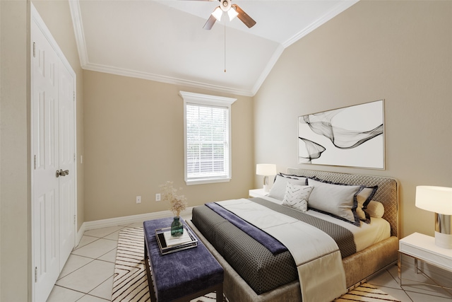 bedroom featuring ceiling fan, light tile patterned flooring, crown molding, and vaulted ceiling