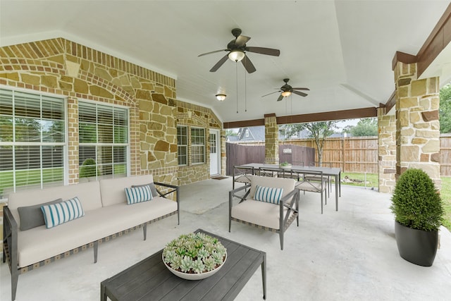 view of patio with outdoor lounge area and ceiling fan