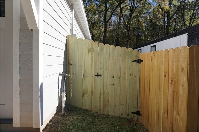 exterior space with a gate and fence