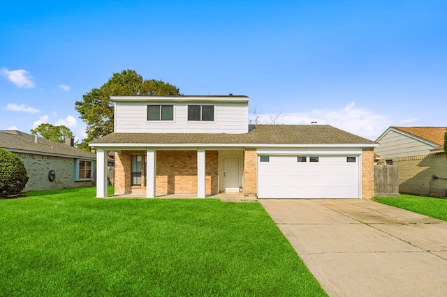 front of property with a garage and a front yard