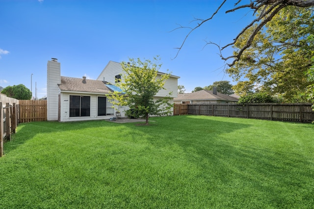 view of yard with a patio area