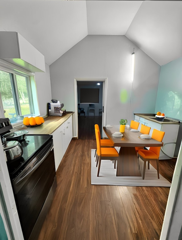 kitchen featuring white cabinets, lofted ceiling, dark hardwood / wood-style floors, and black / electric stove