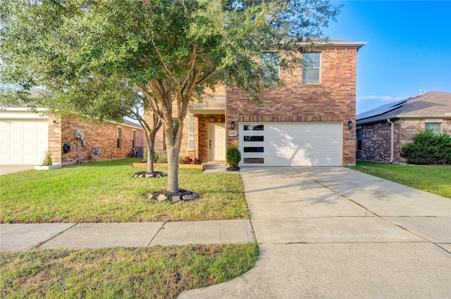 view of front facade featuring a front lawn and a garage