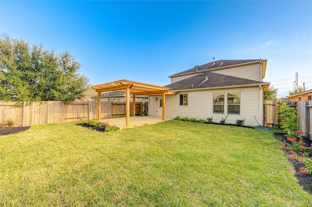 back of property with a lawn, a pergola, and a patio