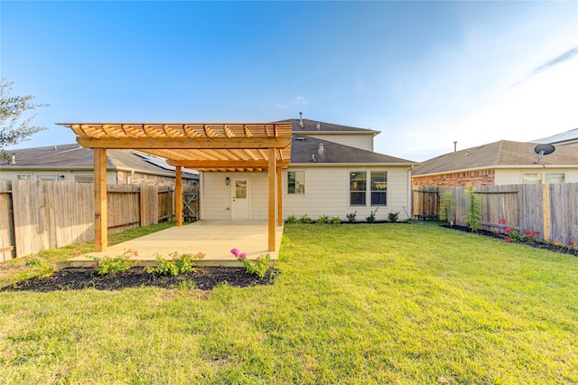 rear view of house with a pergola, a yard, and a deck