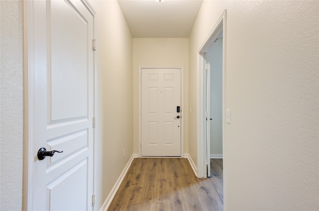 hallway featuring light hardwood / wood-style floors