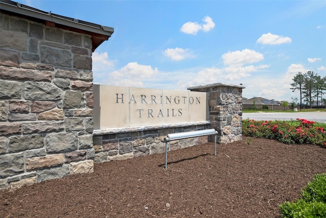 view of community sign