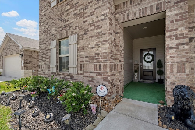 property entrance with a garage