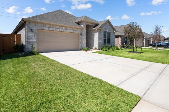 single story home with roof with shingles, a front yard, brick siding, a garage, and concrete driveway