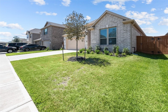 view of front of home featuring a garage, fence, concrete driveway, brick siding, and a front lawn