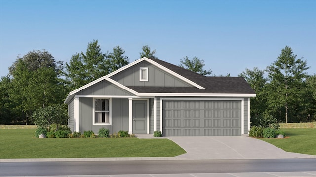 view of front of property featuring a garage and a front yard