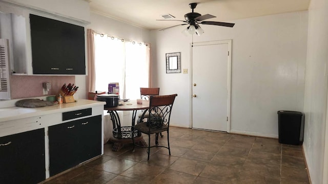 kitchen featuring ceiling fan