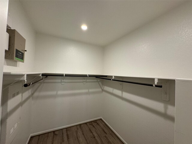 spacious closet featuring hardwood / wood-style flooring