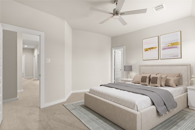 bedroom with ceiling fan and carpet floors