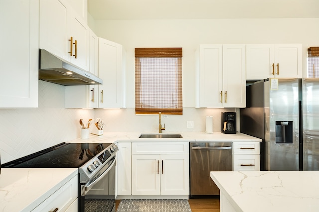 kitchen featuring white cabinets, sink, and stainless steel appliances