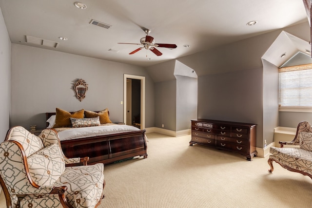 bedroom featuring ceiling fan, lofted ceiling, and light carpet