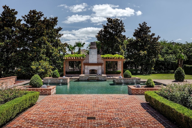 view of pool featuring a patio area