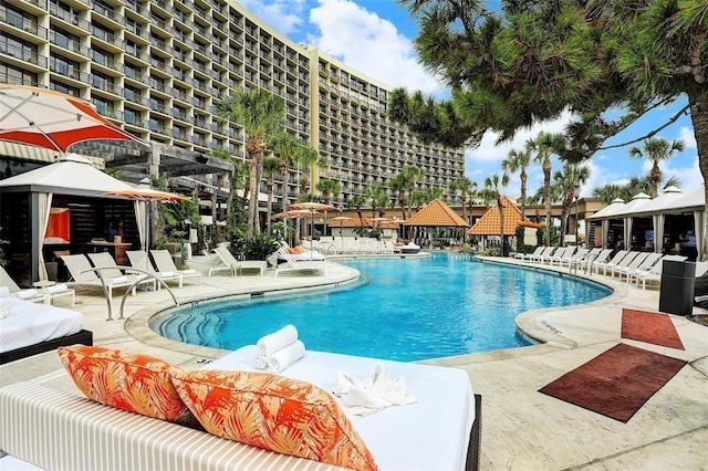 view of swimming pool featuring a patio area