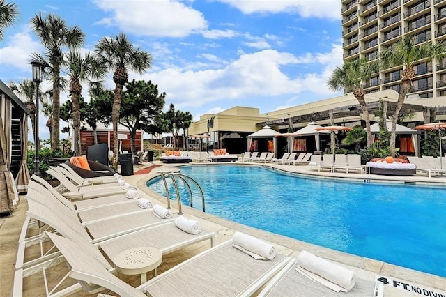 view of swimming pool featuring a patio area