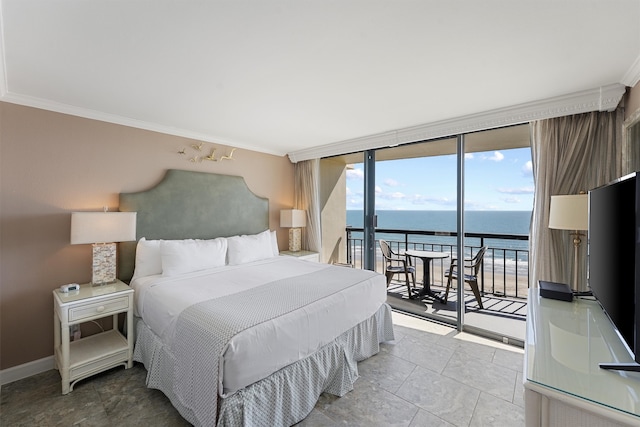 bedroom with expansive windows, crown molding, and access to outside