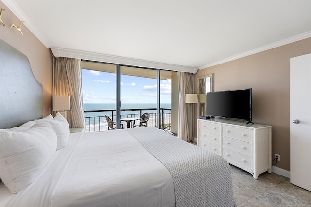 bedroom featuring access to outside, a wall of windows, and ornamental molding