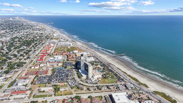 bird's eye view with a view of the beach and a water view