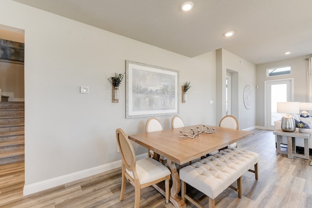 dining area with light hardwood / wood-style flooring