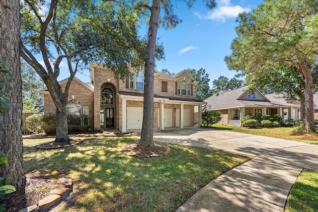 view of front of house with a front lawn and a garage