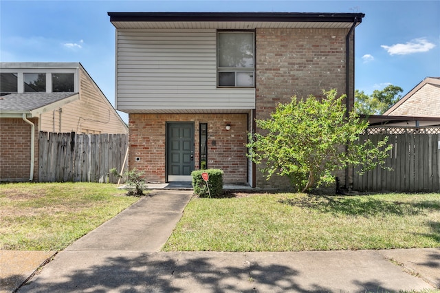 view of front of house with a front yard