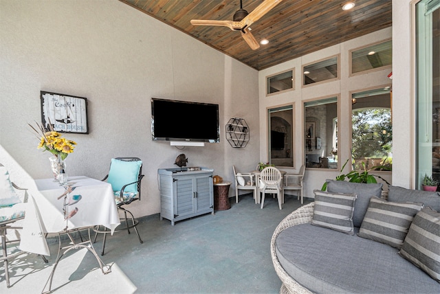 exterior space with ceiling fan, high vaulted ceiling, and wooden ceiling