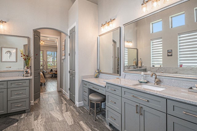 bathroom featuring vanity and hardwood / wood-style floors