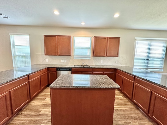 kitchen with light hardwood / wood-style floors and plenty of natural light