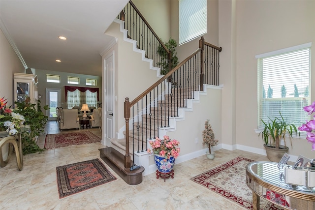 entryway with crown molding