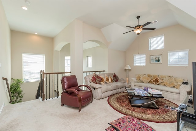 living room featuring lofted ceiling and ceiling fan