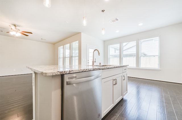 kitchen with white cabinets, an island with sink, sink, stainless steel dishwasher, and dark wood-type flooring