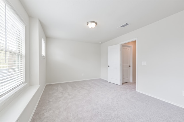 empty room with light carpet