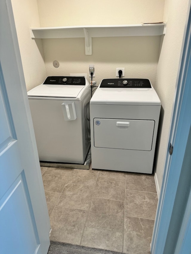 laundry area featuring independent washer and dryer