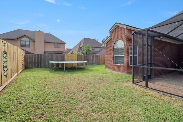 view of yard featuring a trampoline