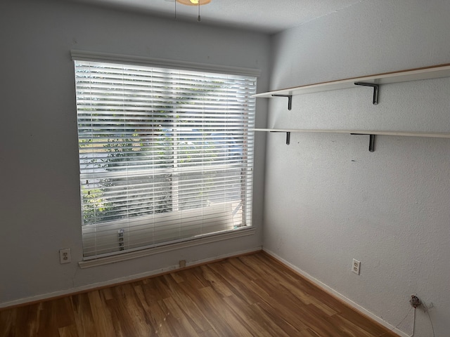 empty room featuring hardwood / wood-style floors