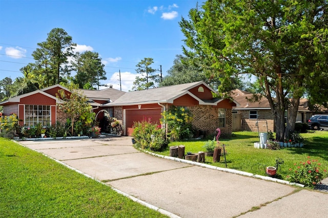 ranch-style house featuring a front yard and a garage